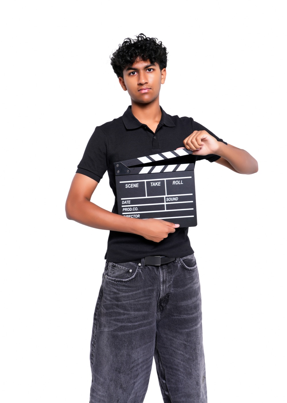 Ritham holding a film clapperboard